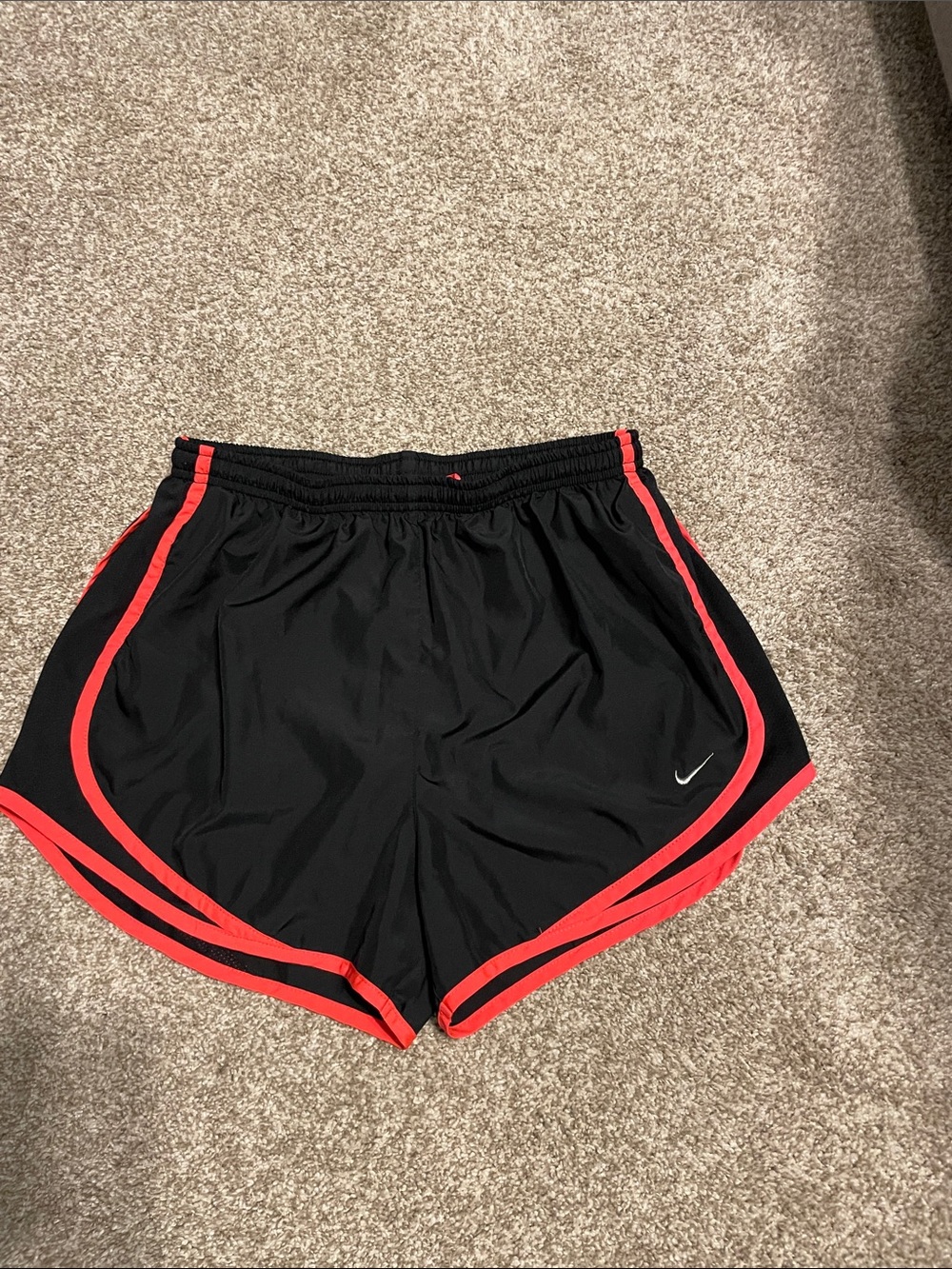 Nike Black Women's Athletic Shorts with bright coral trim